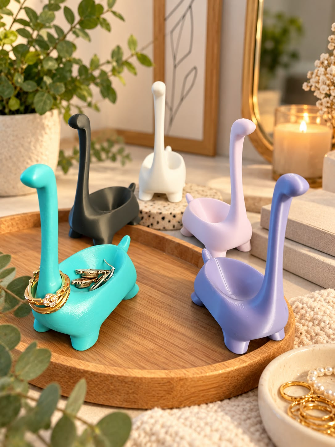 Organizador de joyas con forma de dinosaurio en varios colores